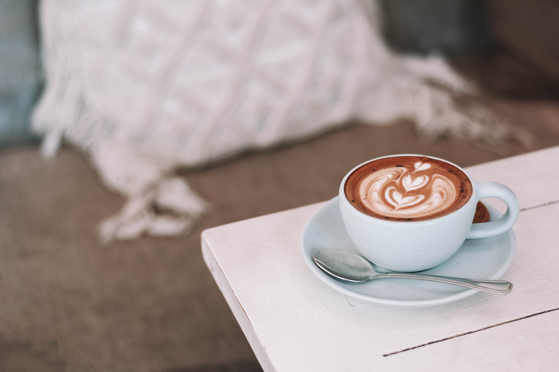 photo of white ceramic teacup